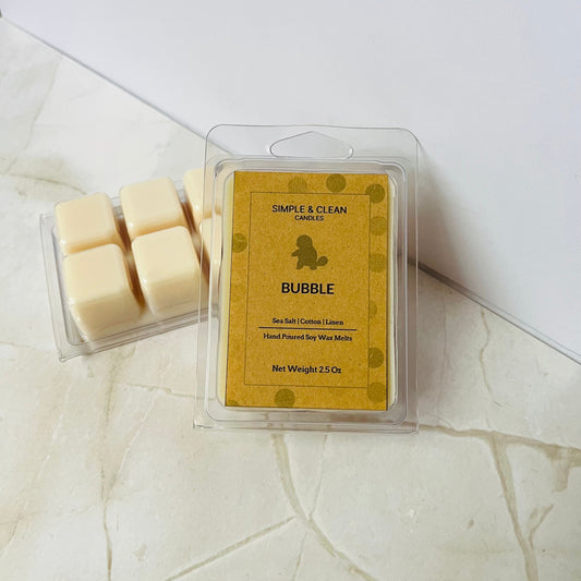 Wax melts in a packaging with 'Simple & Clean' branding on a light surface.