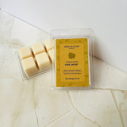Wax melts in a clear container with 'Simple & Clean' packaging on a marble surface.